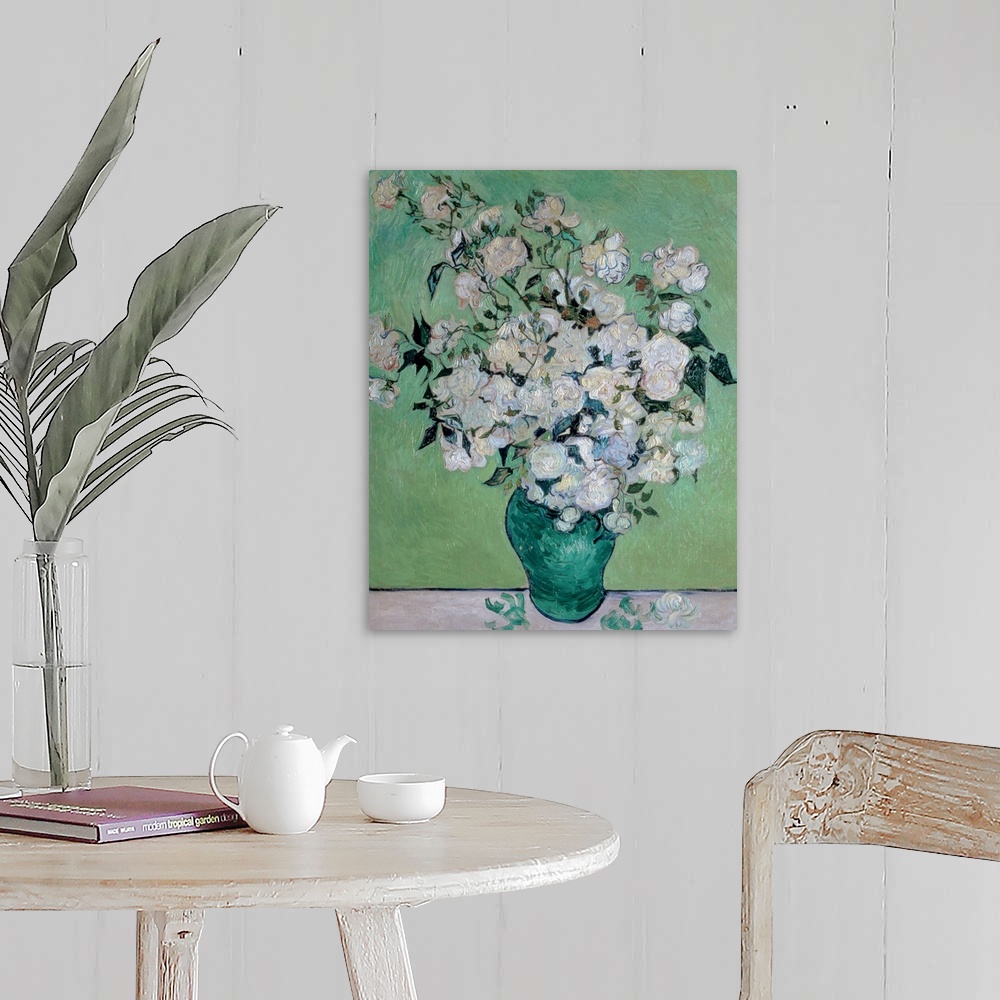 A farmhouse room featuring Painting on canvas of flowers in a vase with a few petals on the table it is sitting on.