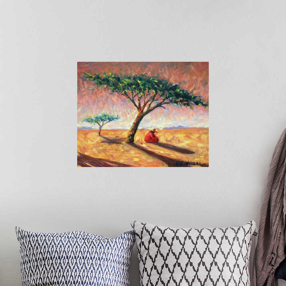A bohemian room featuring Big, landscape painting of an African landscape, the sun shining over a large tree where a person...