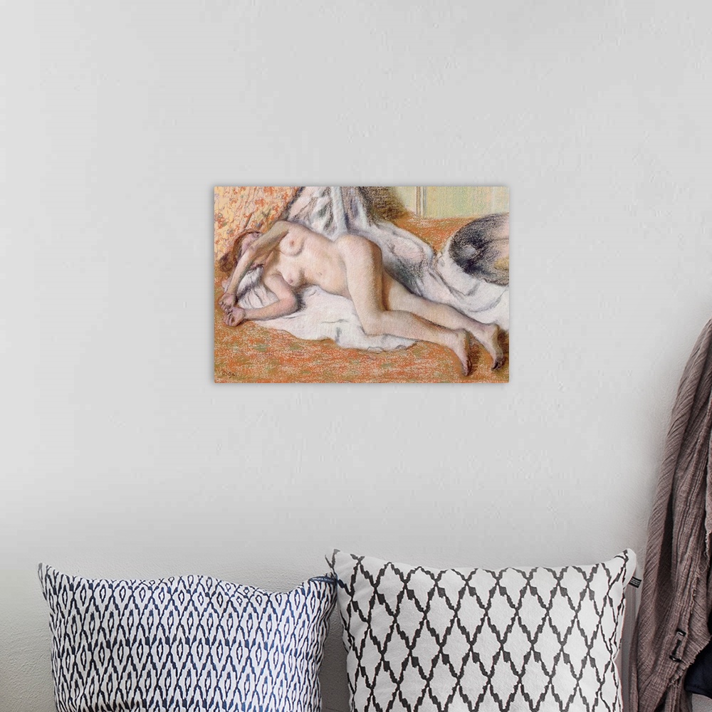 A bohemian room featuring Horizontal, classic artwork on a big canvas of a nude woman lying on her side on a draping white ...