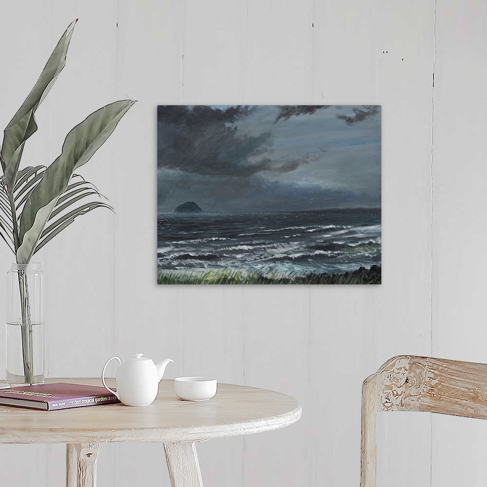 A farmhouse room featuring Contemporary painting of an idyllic seascape under stormy clouds.