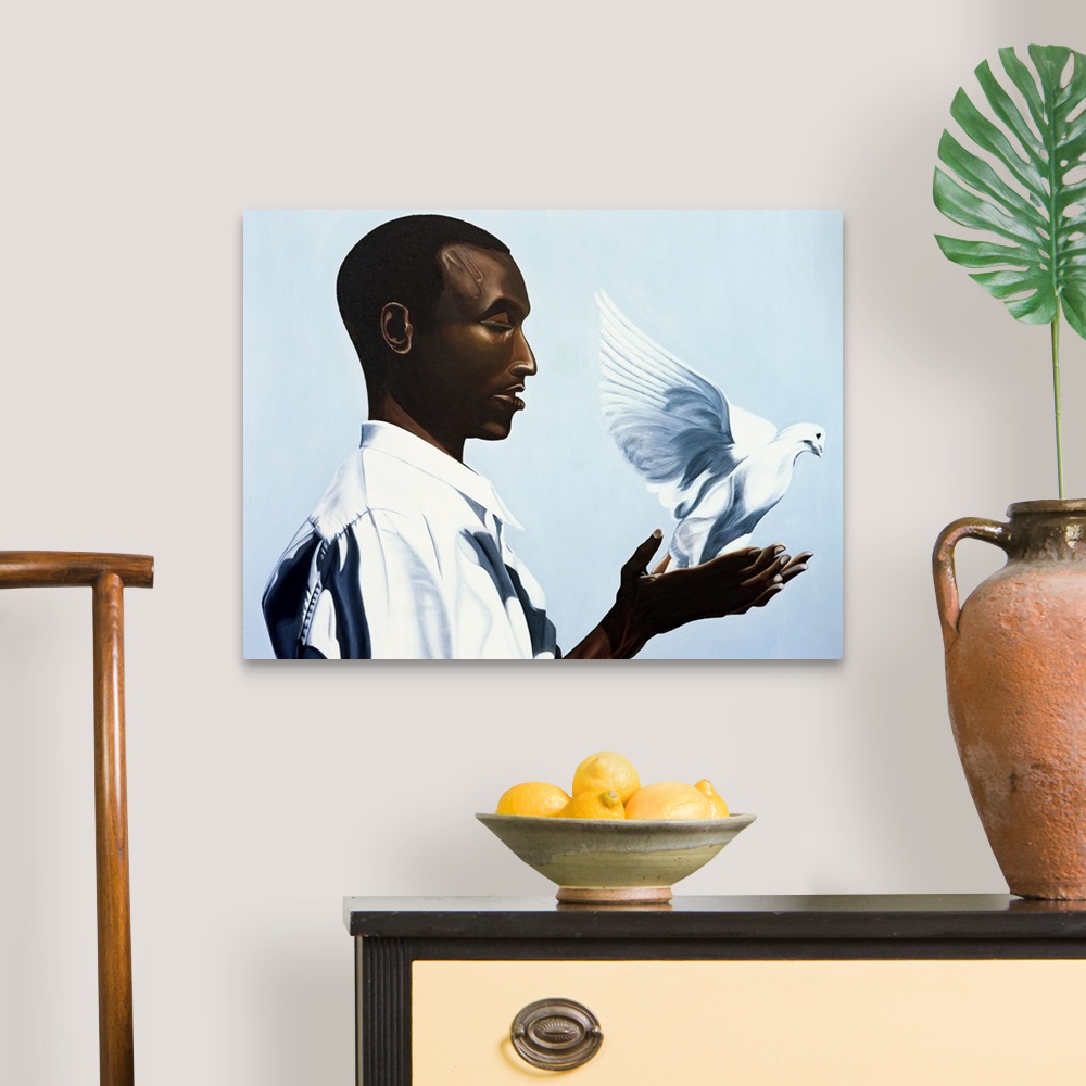 A traditional room featuring Large oil painting of a man holding a dove that is flying away.