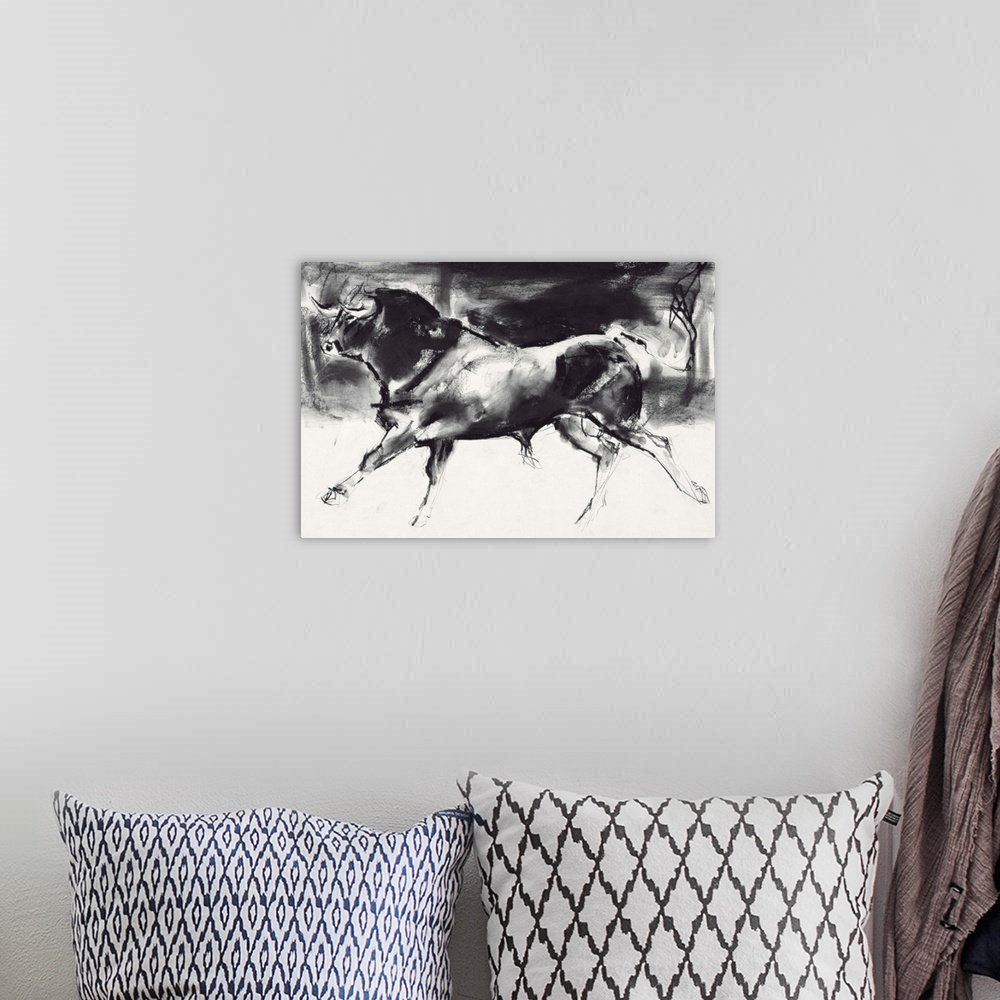A bohemian room featuring Contemporary painting of a large bull running.