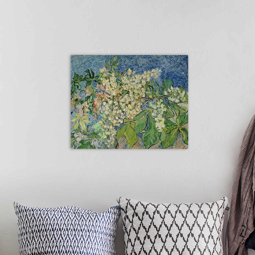A bohemian room featuring This large artwork piece is of small white flowers and different shaped green leaves with various...