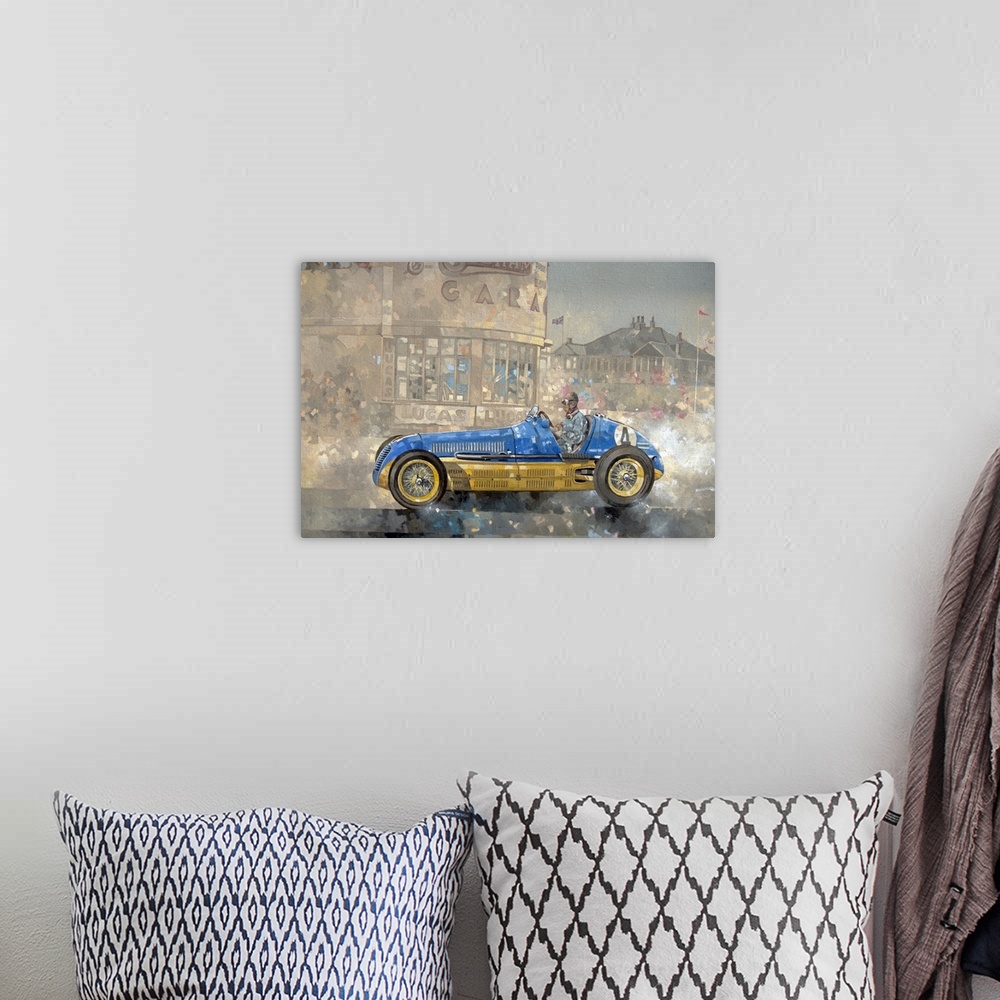 A bohemian room featuring Contemporary oil painting of a race car driver in a vintage Maserati against a softened background.