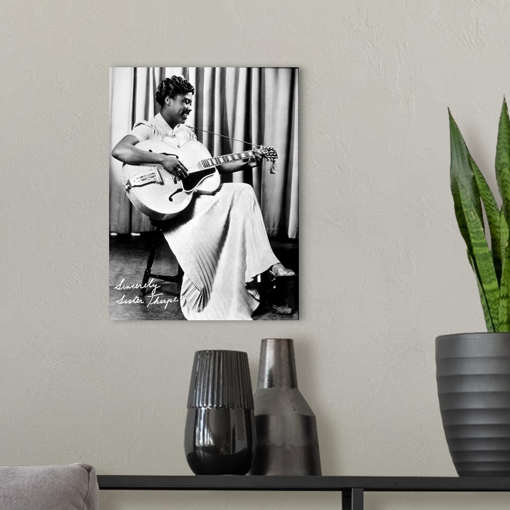 A modern room featuring Sister Rosetta Tharp blues guitarist and Singer, here playing steel guitar; (add.info.: Sister Ro...