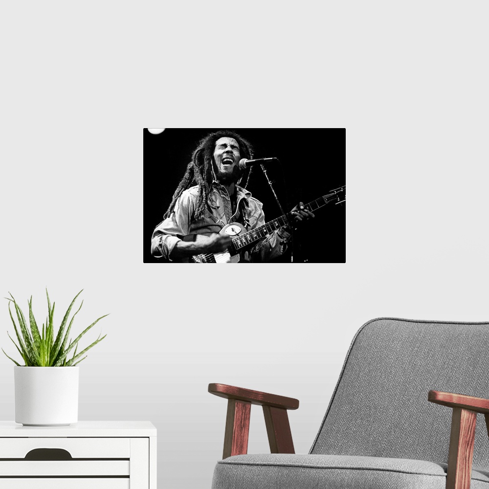A modern room featuring Bob Marley on stage in 1976