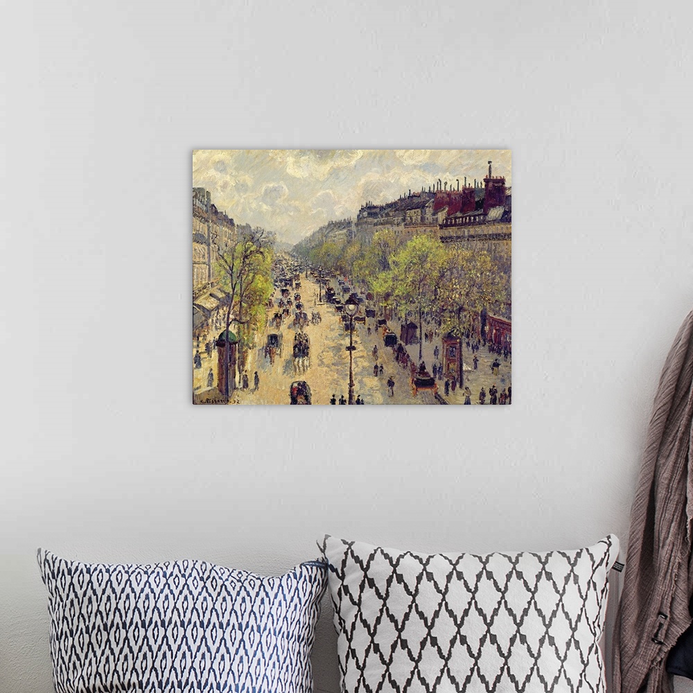 A bohemian room featuring Painting of busy street filled with pedestrians and horse carriages.  The street is lined with st...