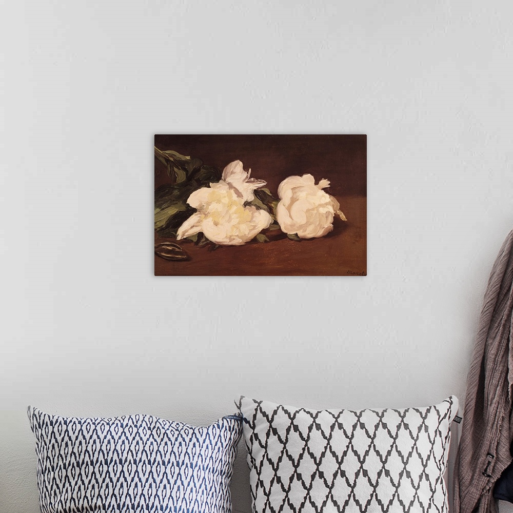 A bohemian room featuring Oil painting of two pastel colored flowers and their leaves scattered on a table.
