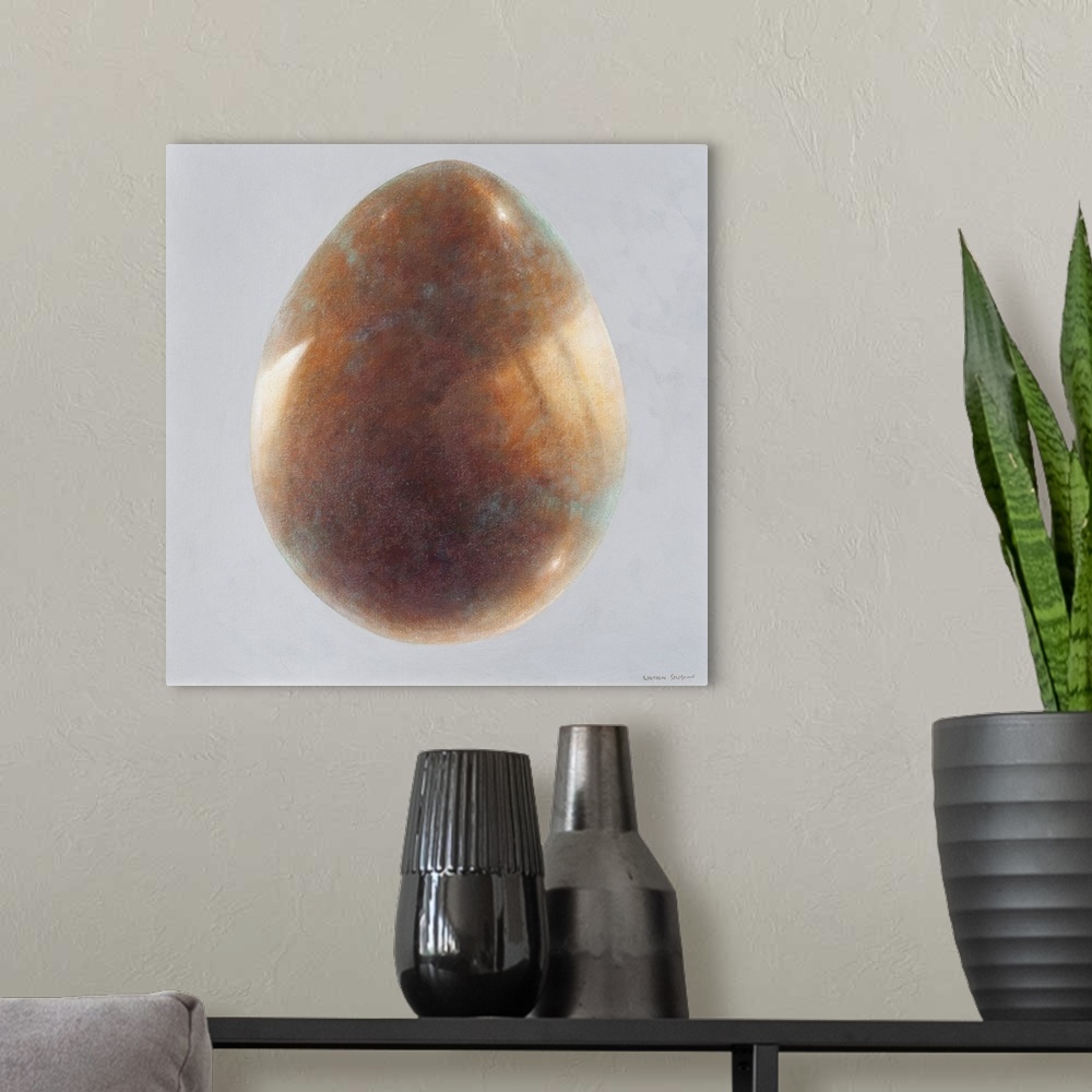 A modern room featuring Contemporary painting of a bronze egg against a light gray background.