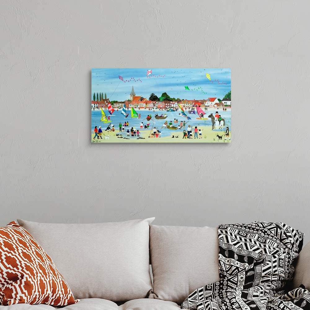 A bohemian room featuring Contemporary painting of a beach full of people in the summer.
