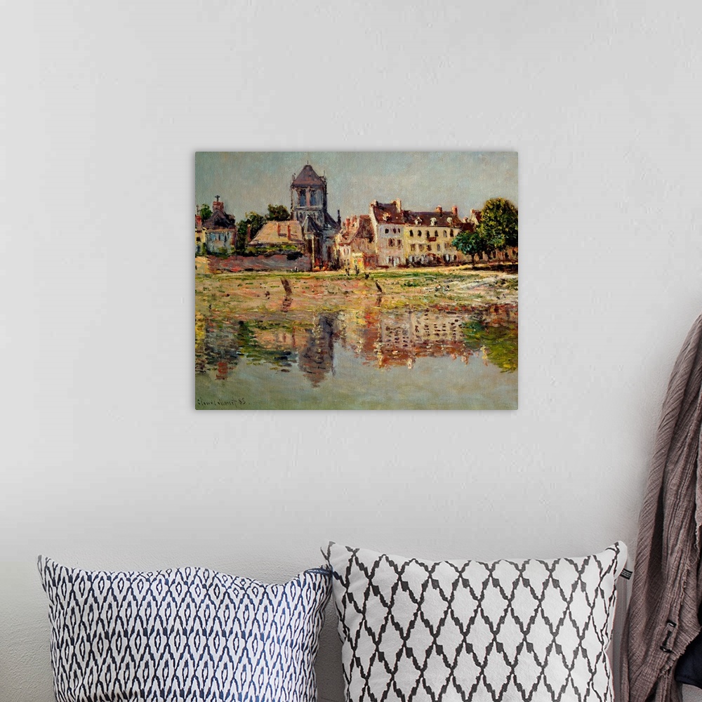 A bohemian room featuring A piece of classic artwork that is a painting of homes lining a body of water that can be seen re...
