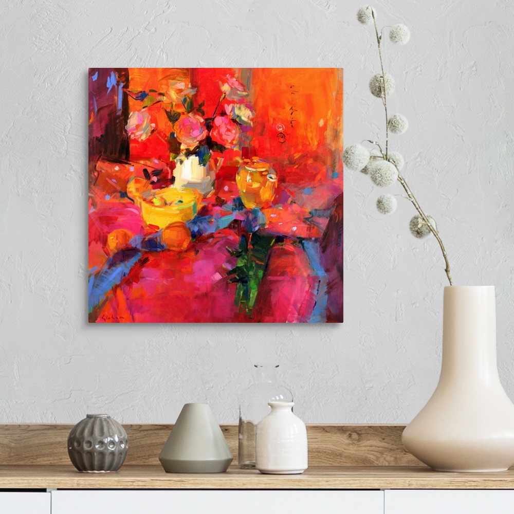A farmhouse room featuring A contemporary painting that uses vibrant colors to paint a vase of flowers and fruit sitting on ...
