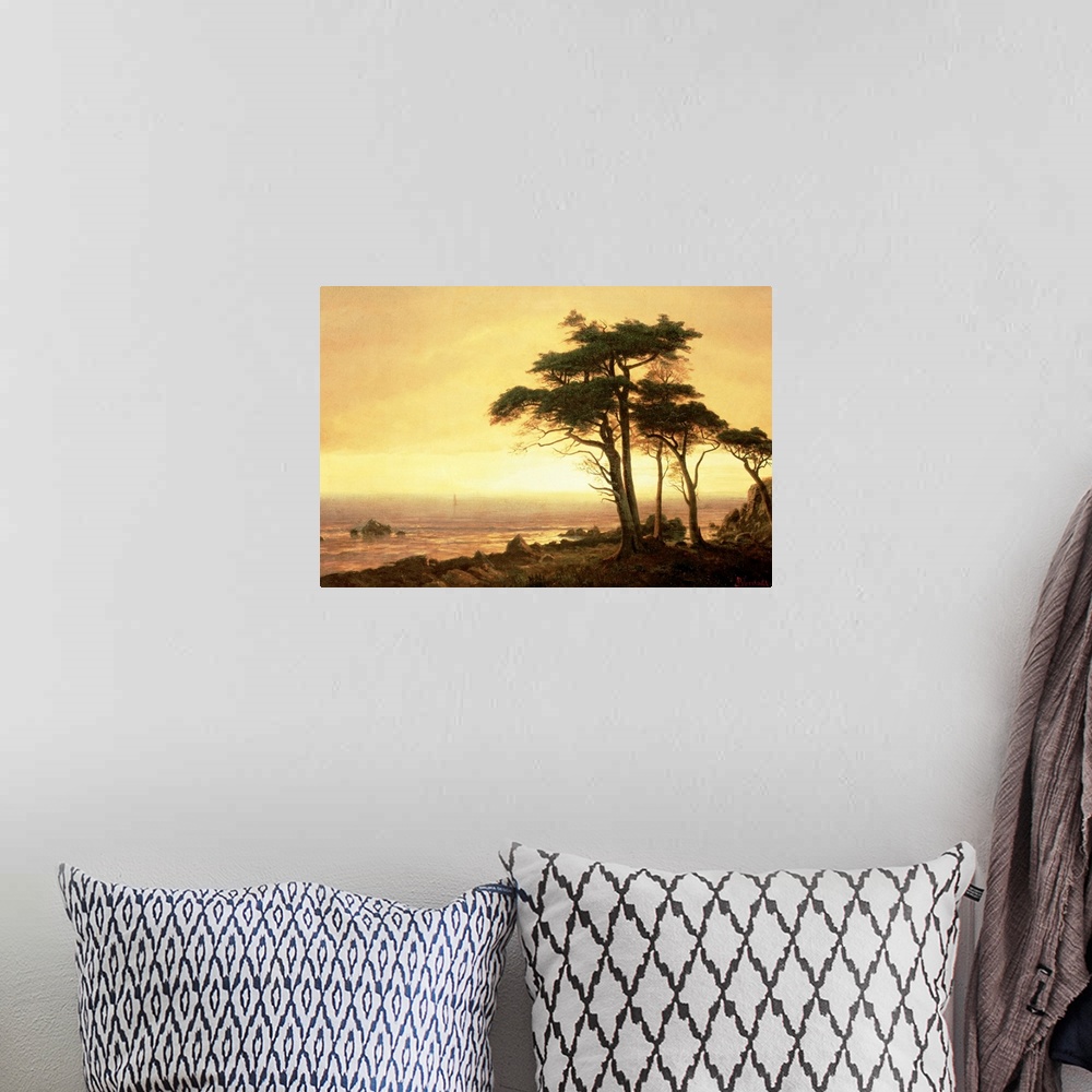 A bohemian room featuring This classic piece of artwork has a large tree that grows near the ocean coast with a sunset pain...