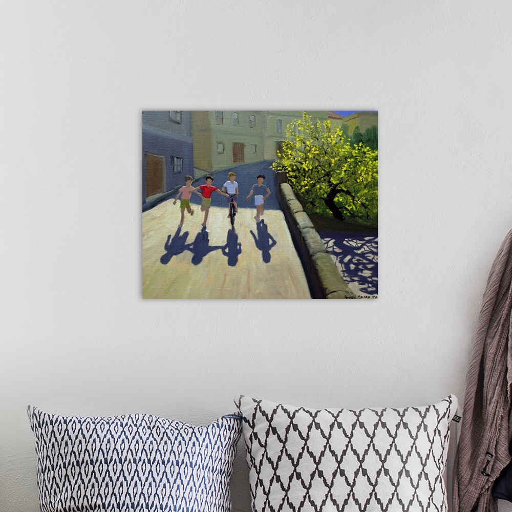 A bohemian room featuring Horizontal painting on a big canvas of three children running alongside one that is on a bicycle,...