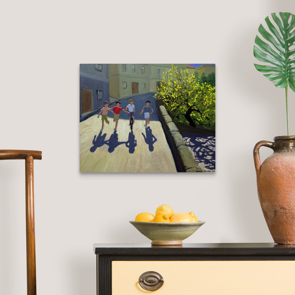 A traditional room featuring Horizontal painting on a big canvas of three children running alongside one that is on a bicycle,...