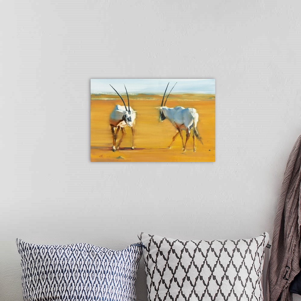 A bohemian room featuring Contemporary wildlife painting of two Oryx in the desert.