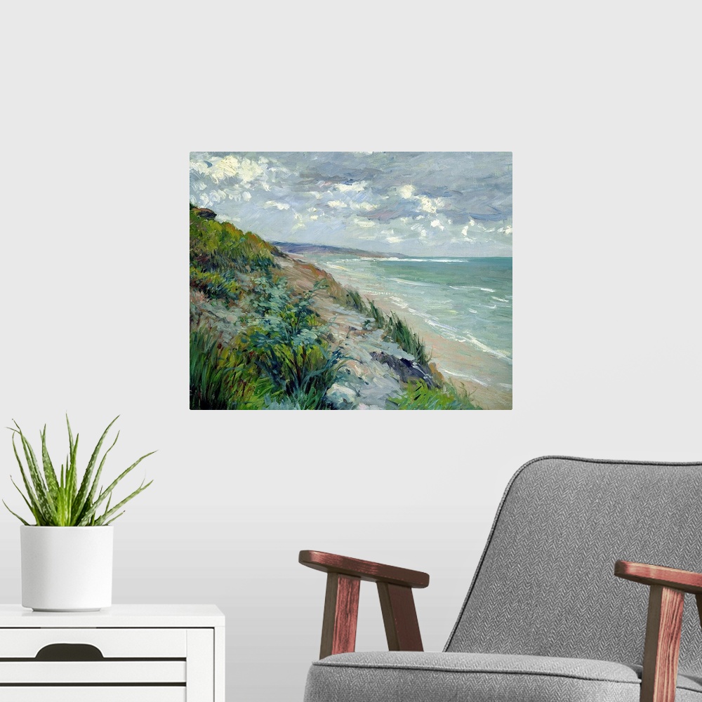 A modern room featuring Impressionist landscape painting of the beach and a sea cliff covered in grass on a cloudy day.