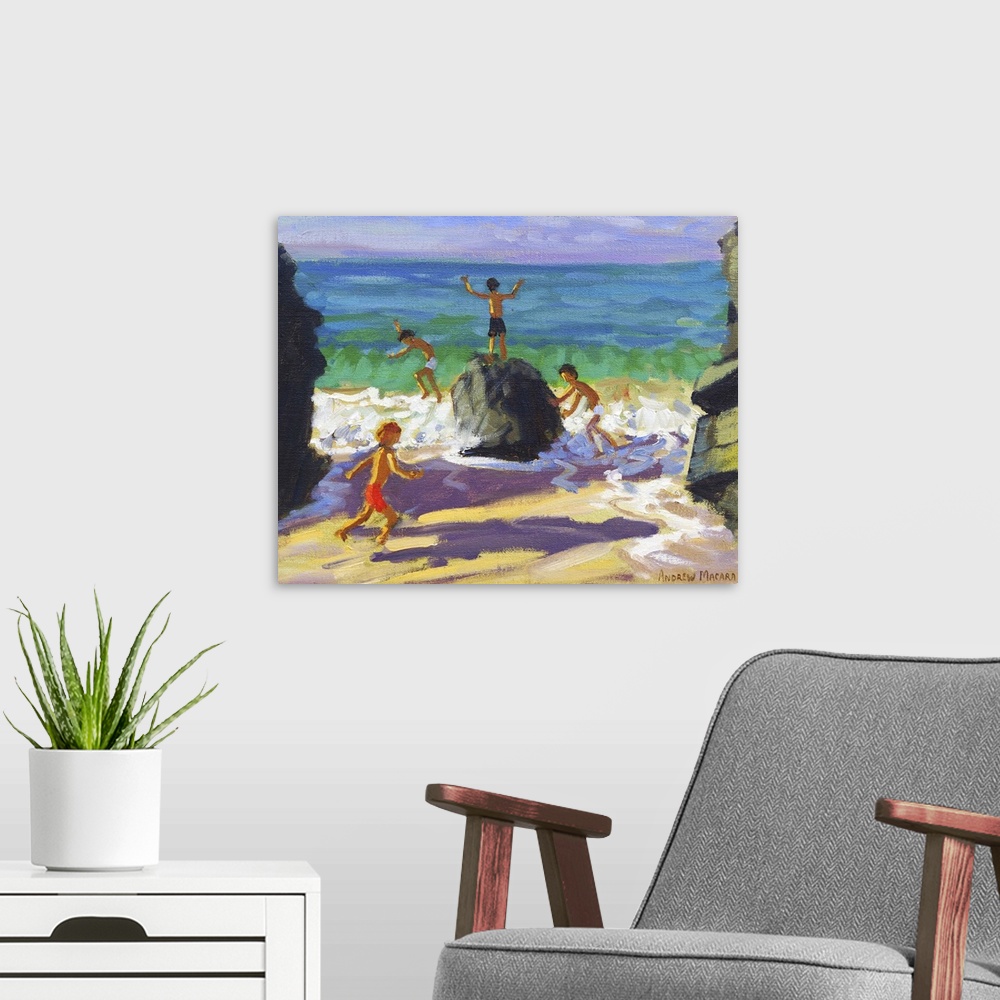 A modern room featuring Contemporary painting of children playing on rocks on a beach.