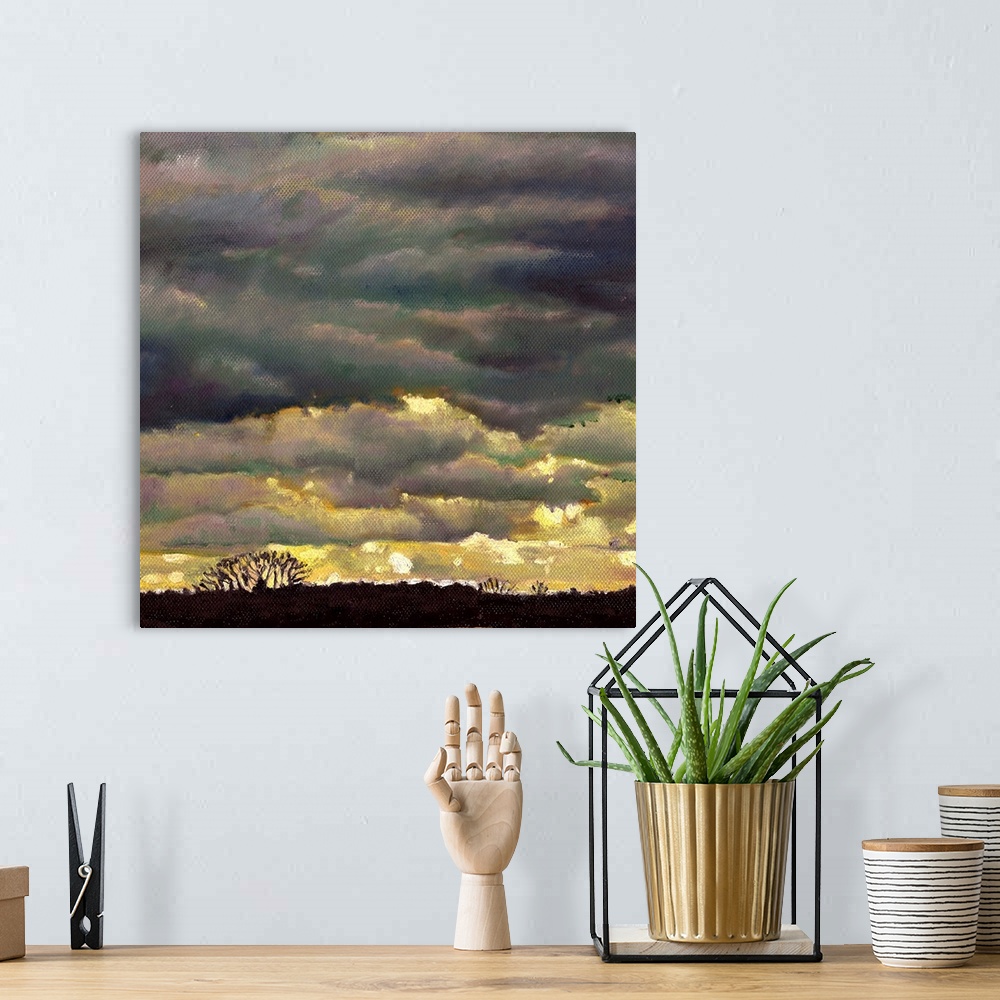 A bohemian room featuring Contemporary painting of a sky with layers of ominous looking clouds.