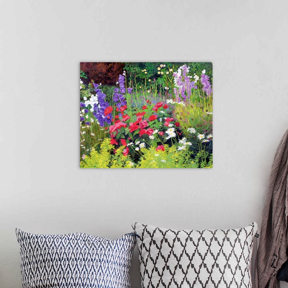 A bohemian room featuring Horizontal , floral painting of many types of colorful, blooming flowers in a flower garden, surr...