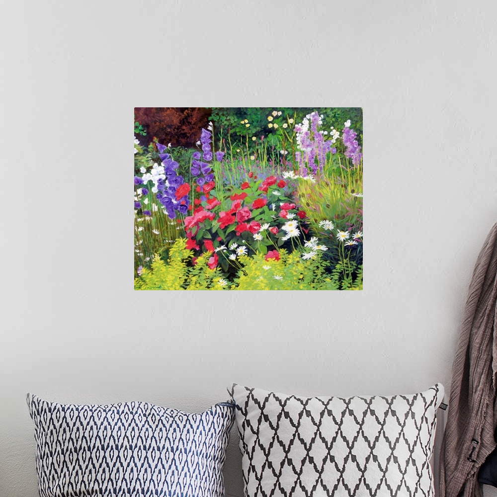 A bohemian room featuring Horizontal , floral painting of many types of colorful, blooming flowers in a flower garden, surr...