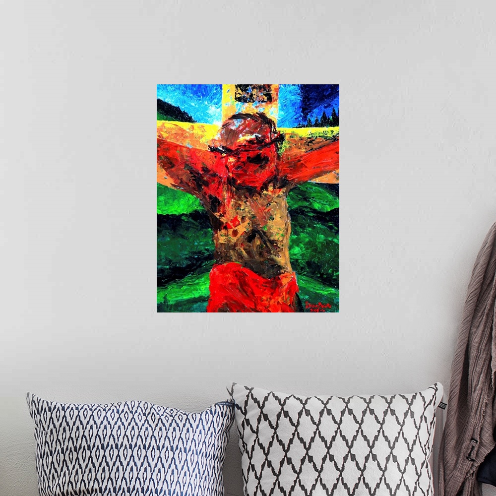 A bohemian room featuring Contemporary religious painting of Christ on the cross.