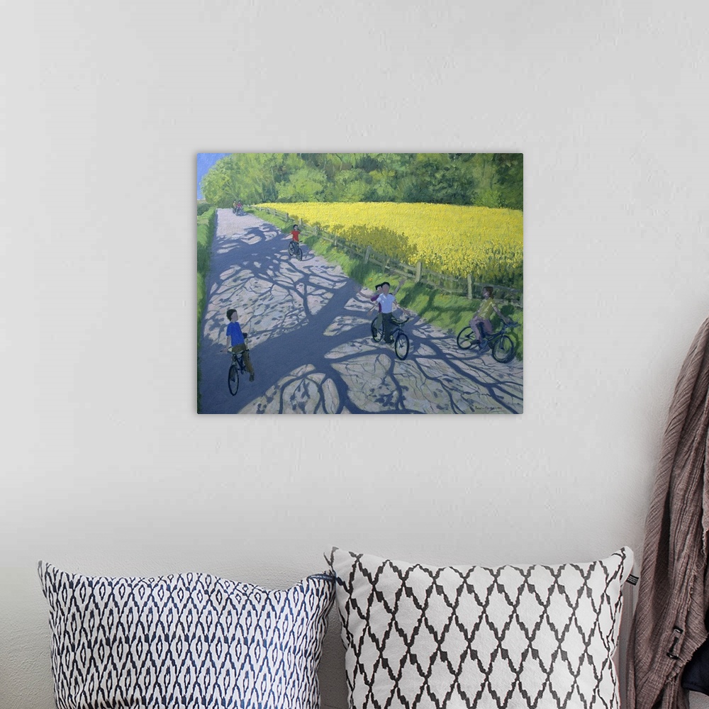 A bohemian room featuring Oil painting of kids on bikes riding down a path lined with a brightly colored flower meadow with...