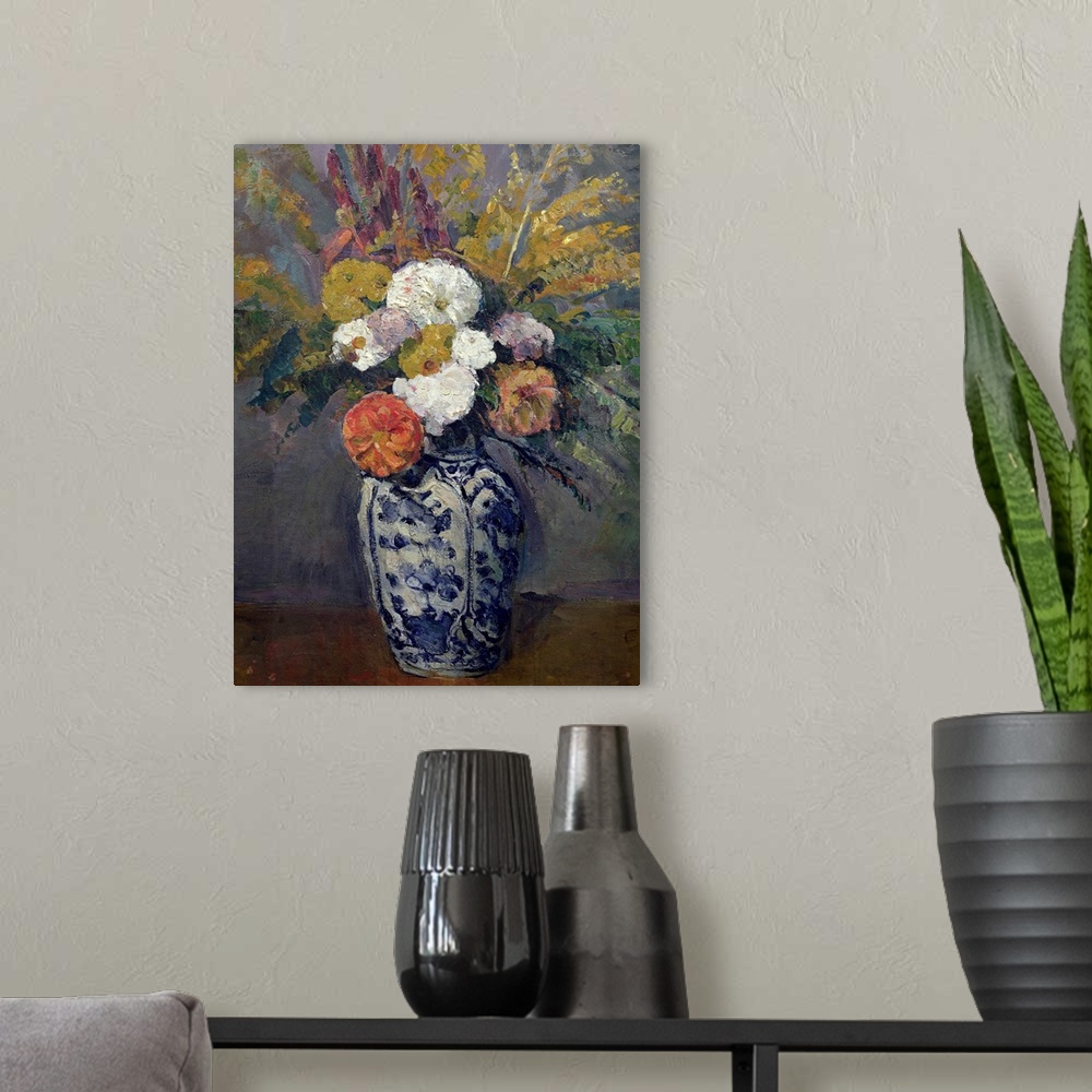 A modern room featuring A painting by a classic art master, this is a vertical still life of fresh cut flowers in a blue ...