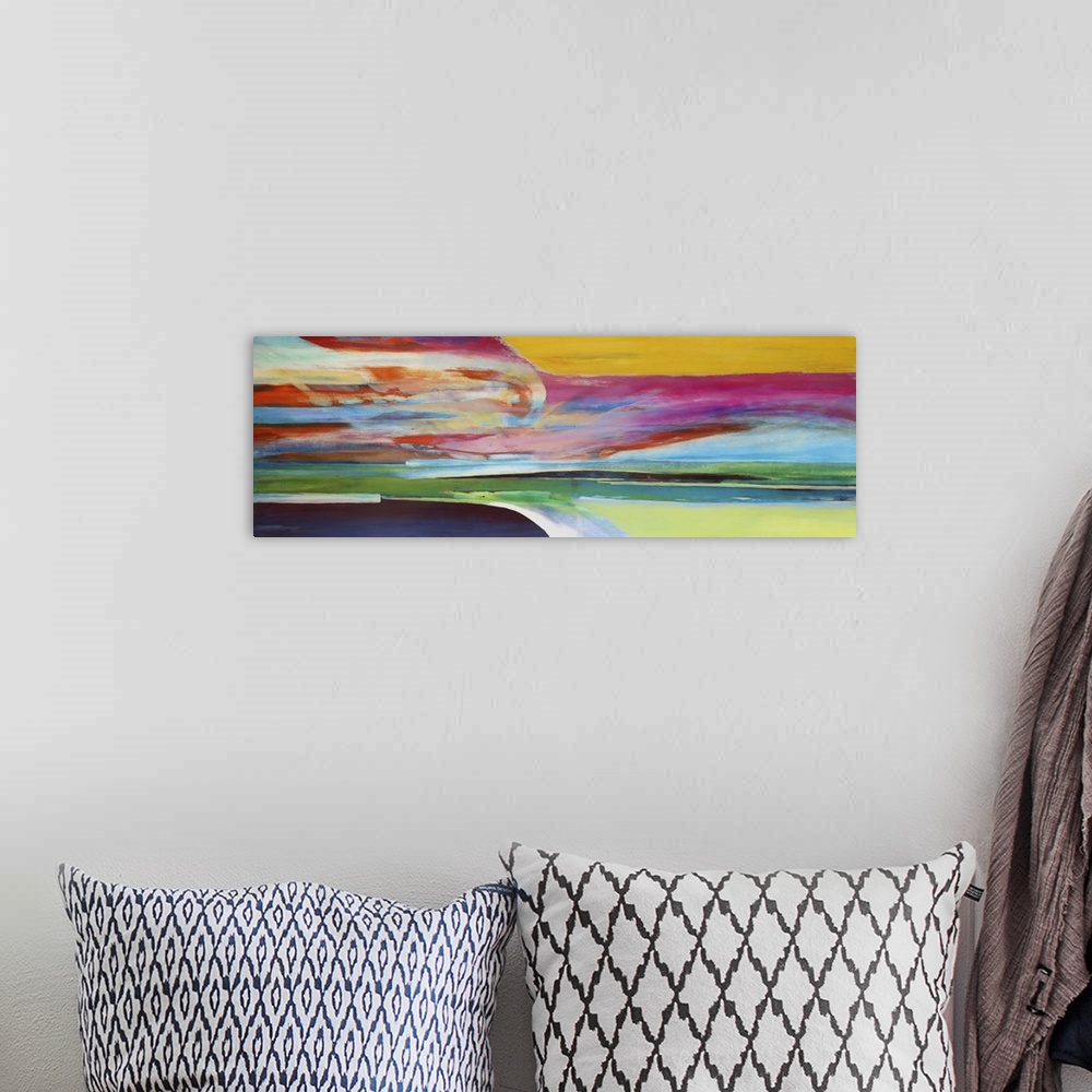 A bohemian room featuring Contemporary colorful abstract painting resembling a landscape.