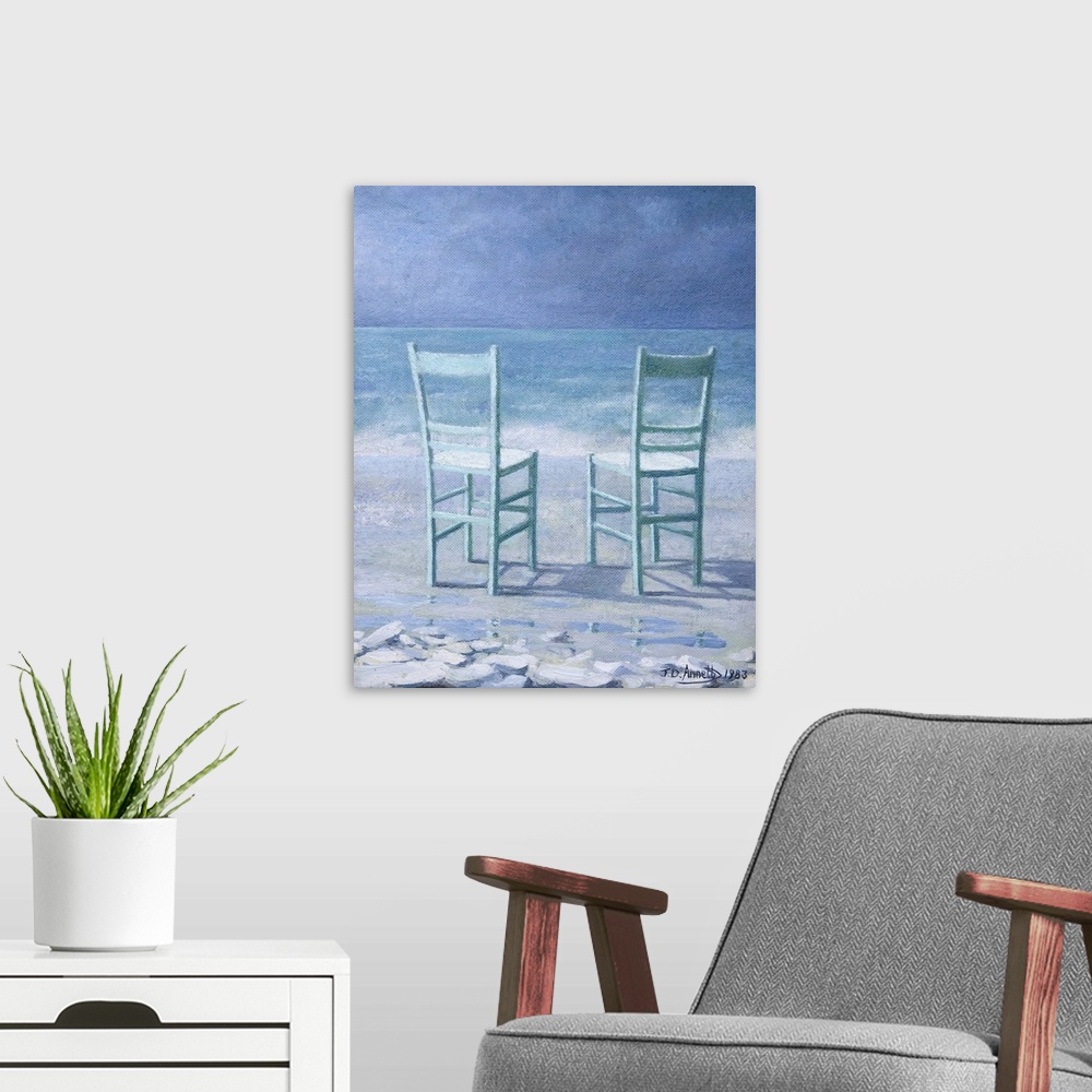 A modern room featuring Contemporary painting of two table chairs sitting on a beach facing the sea.