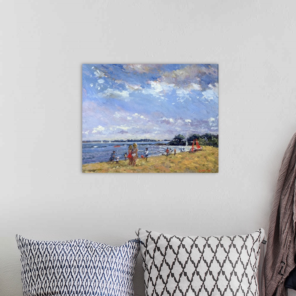 A bohemian room featuring Contemporary painting of people playing on the beach in the summer.