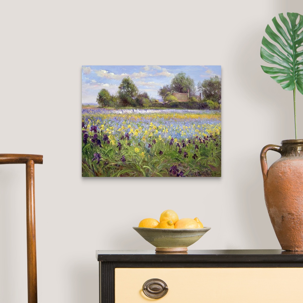 A traditional room featuring Painting on canvas of a field of wildflowers with a house and trees in the distance.