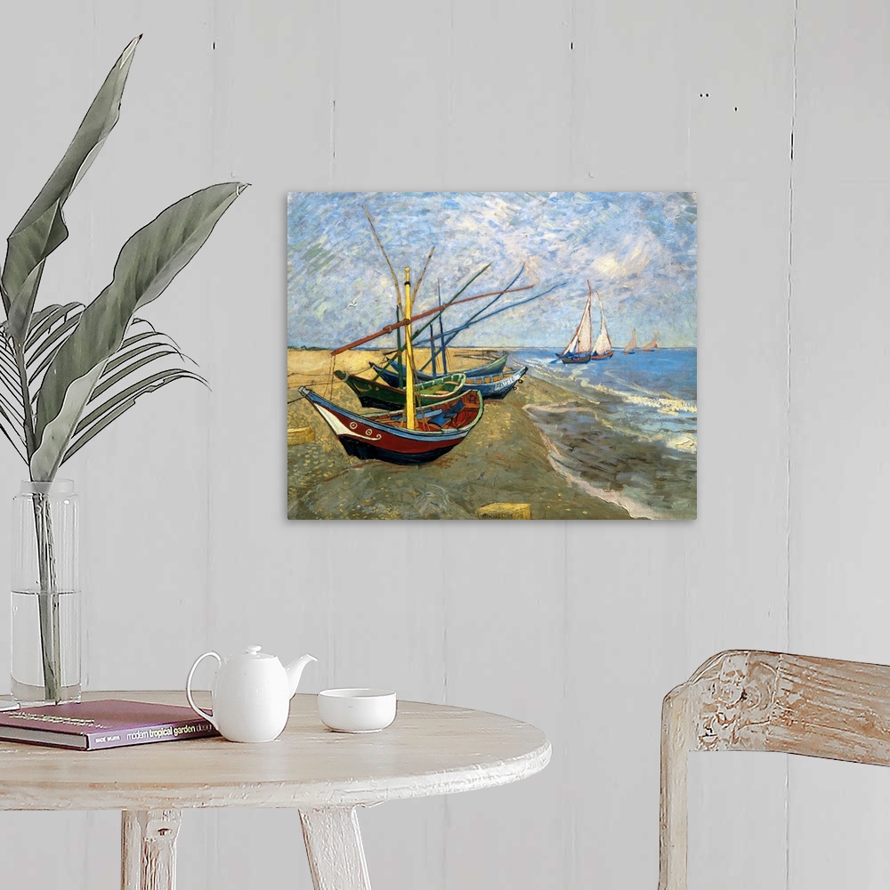 A farmhouse room featuring Classical painting of fishing vessels docked on sand with sailboats sailing just off the shore on...