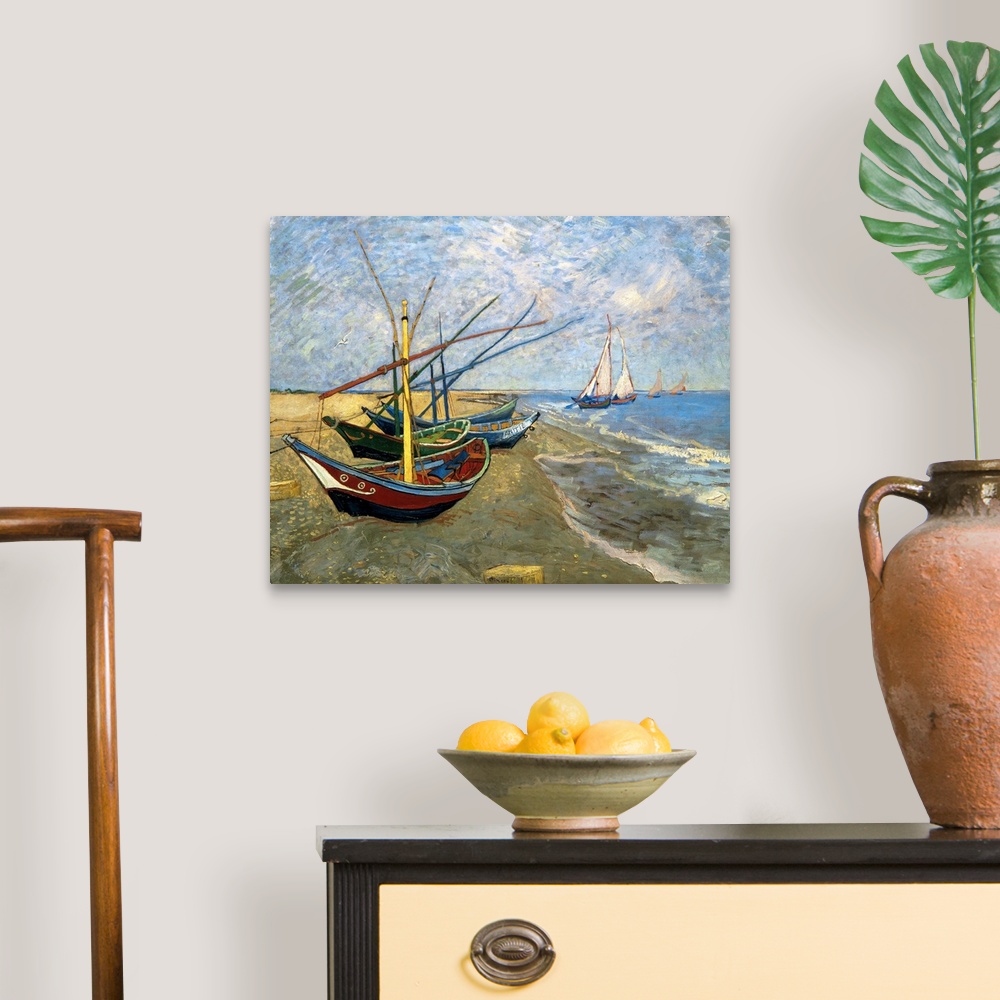 A traditional room featuring Classical painting of fishing vessels docked on sand with sailboats sailing just off the shore on...