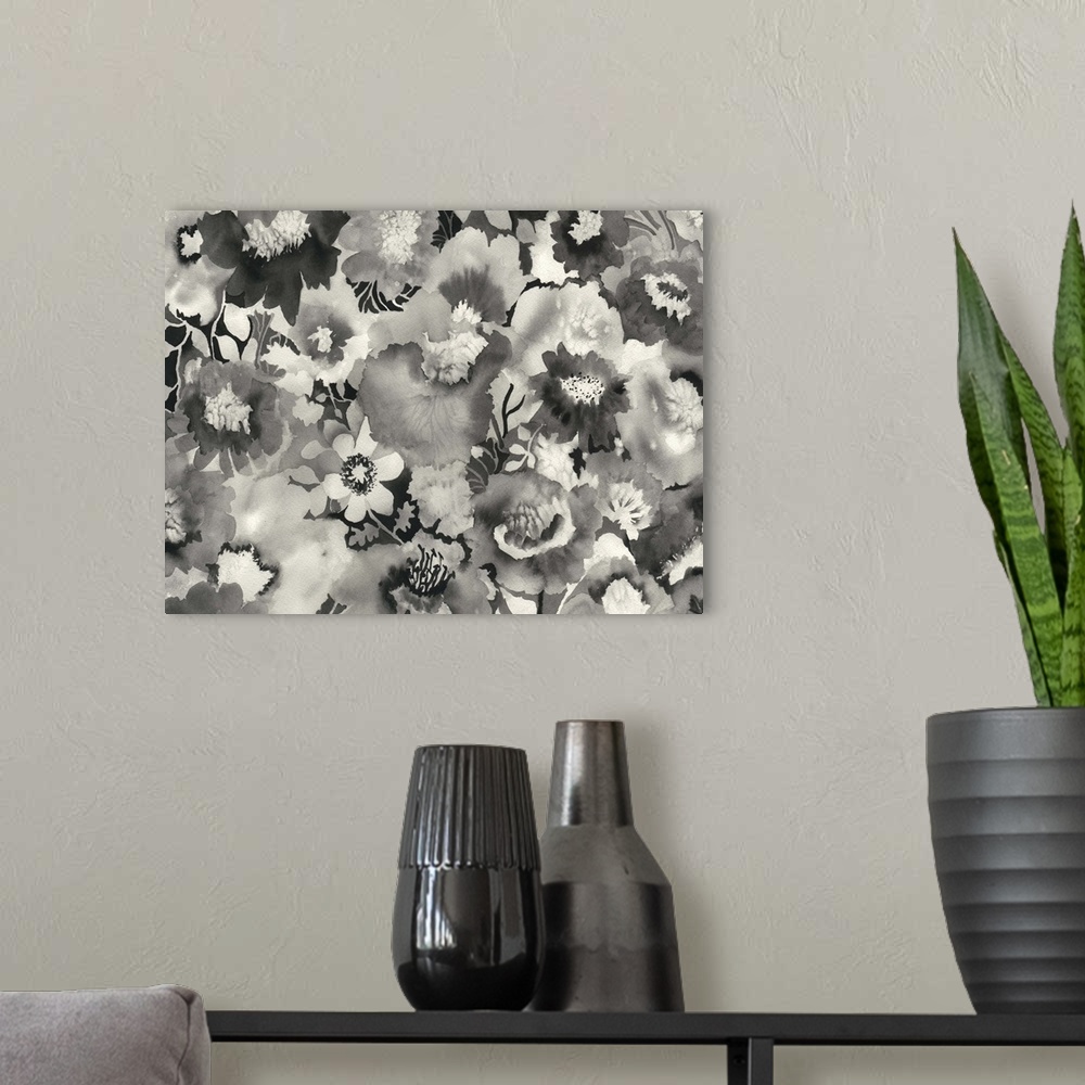 A modern room featuring , contemporary artwork sing black ink to make a collection of flowers.