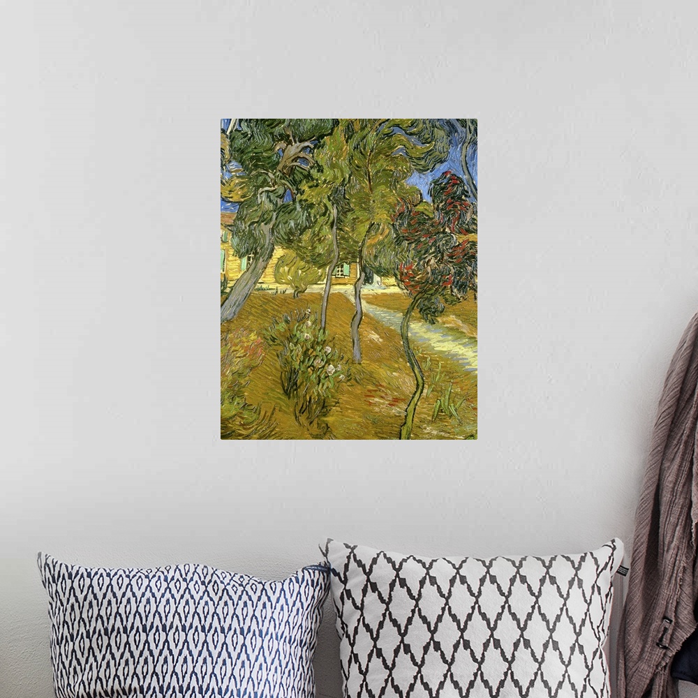A bohemian room featuring Big painting on canvas of different trees on a hill near a building made up of curving brushstrokes.