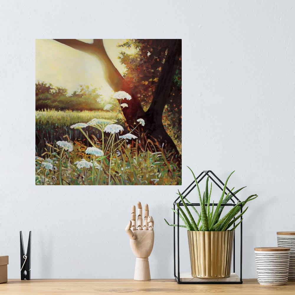 A bohemian room featuring Contemporary painting of wildflowers in a forest clearing at sunset.