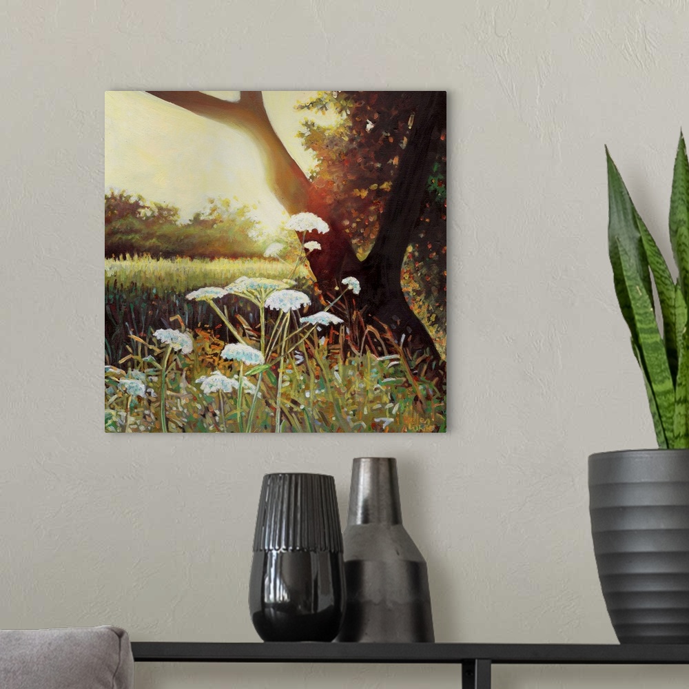 A modern room featuring Contemporary painting of wildflowers in a forest clearing at sunset.