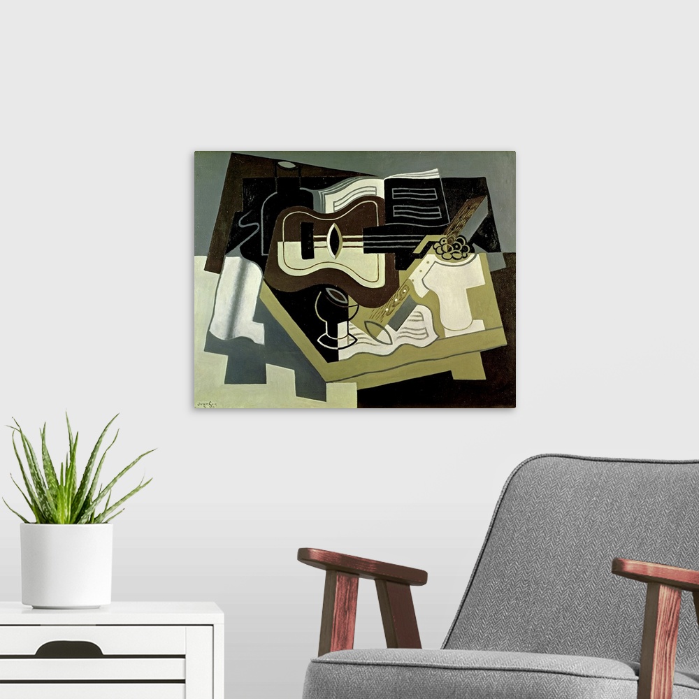 A modern room featuring Abstract artwork of a guitar and clarinet with blocks of color patched together behind it.