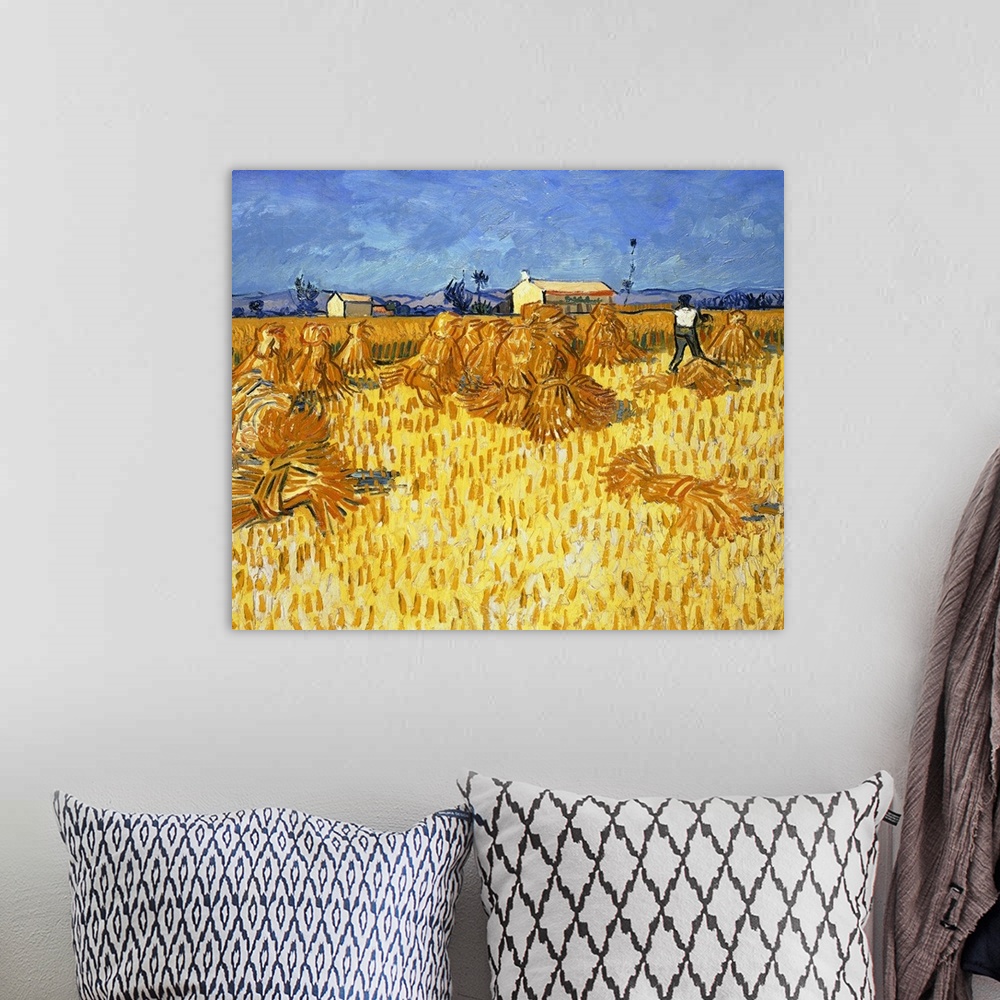 A bohemian room featuring Classic painting by Vincent Van Gogh of a figure working in a field on a bright summer day.