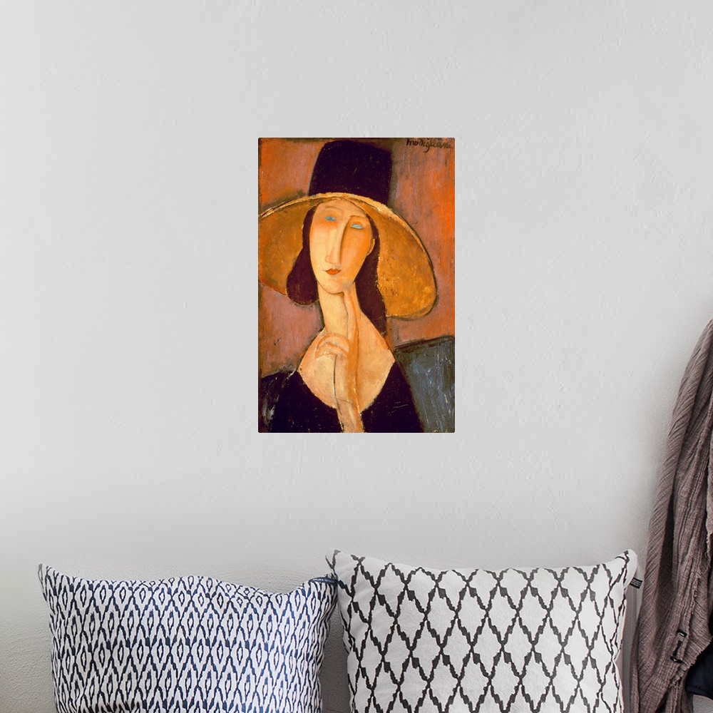 A bohemian room featuring CH378360 Head of a Woman (oil on canvas) by Modigliani, Amedeo (1884-1920); Private Collection; (...