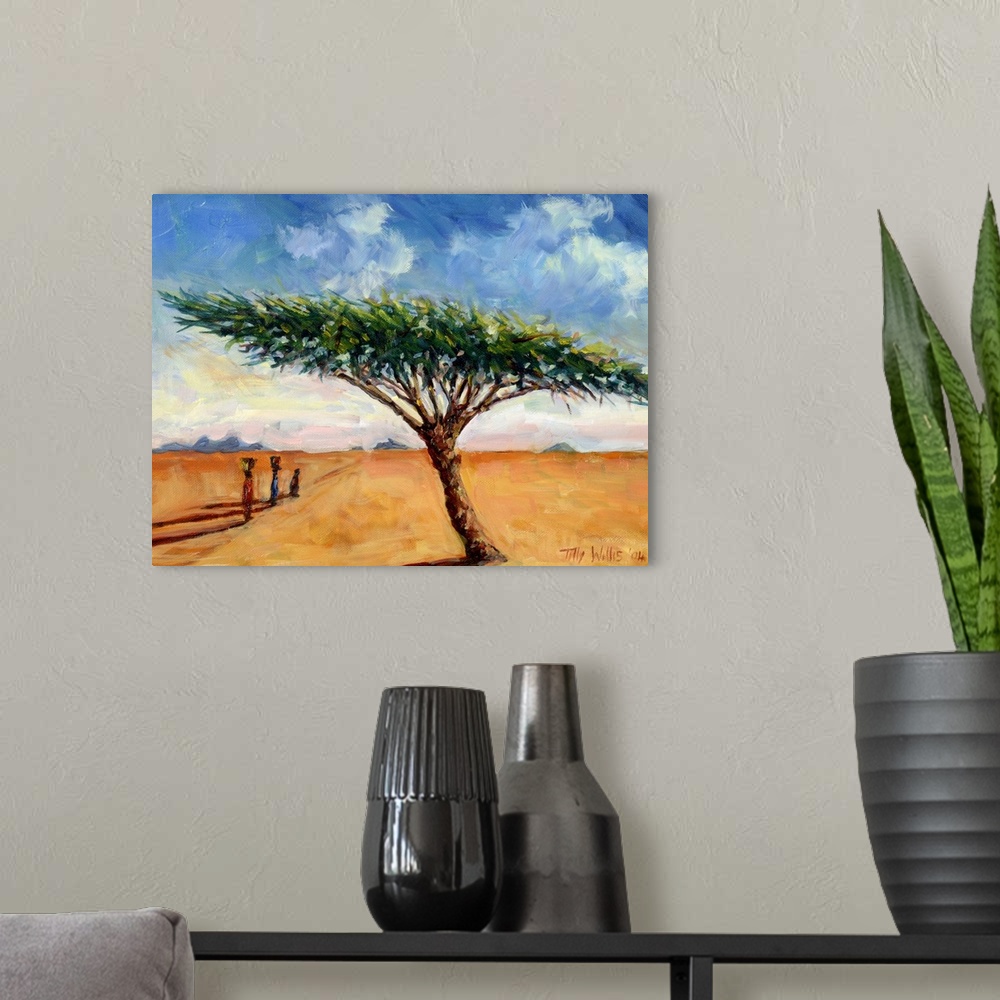 A modern room featuring Oil painting of African family walking in the desert with water pots on their heads under a cloud...