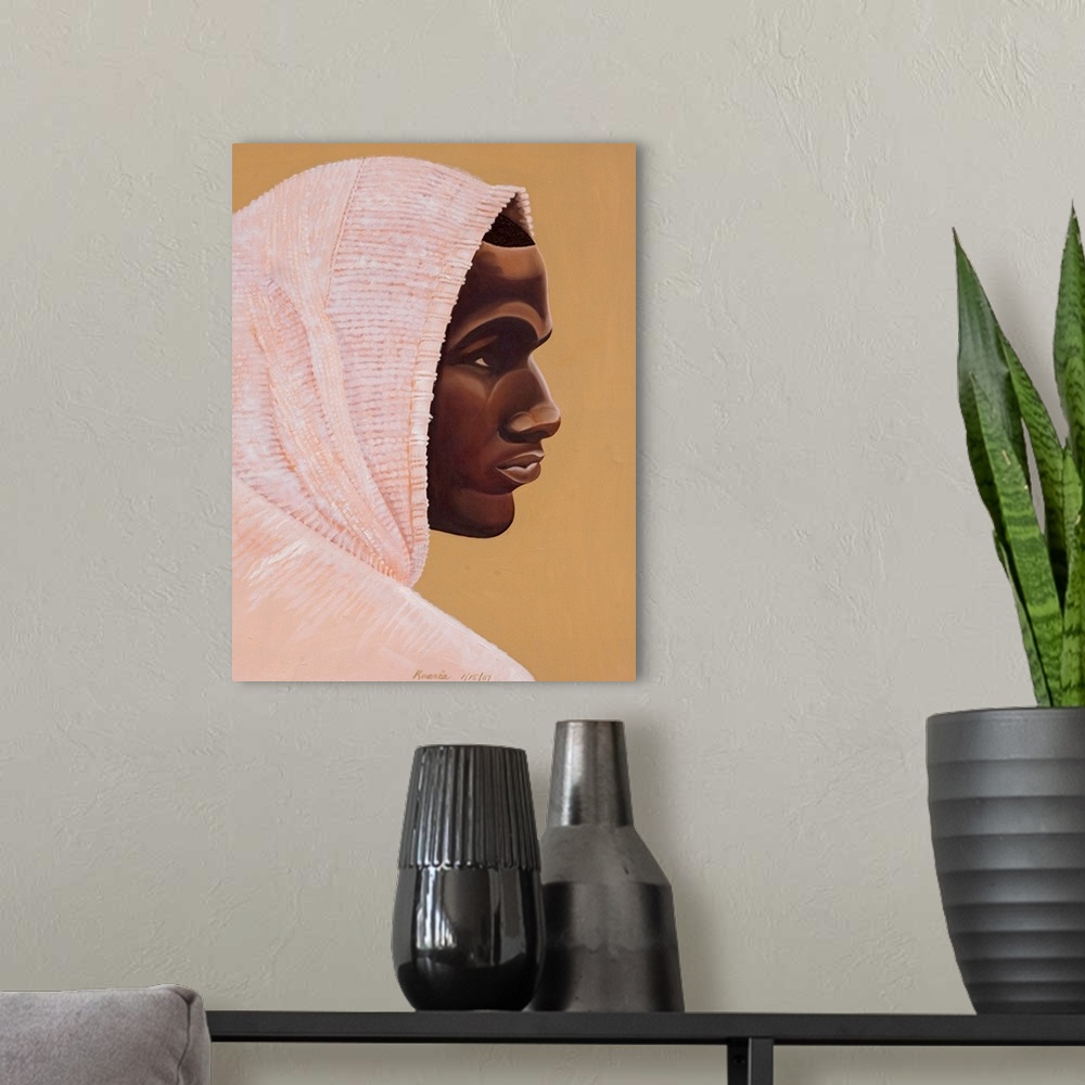A modern room featuring Large painting on canvas of the profile of a man wearing a hooded outfit.