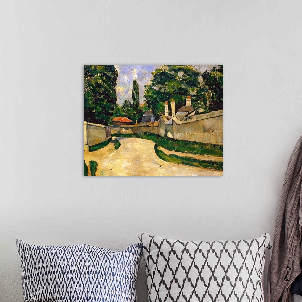 A bohemian room featuring Landscape, classic art painting on a large canvas of a winding road with stone walls on either si...