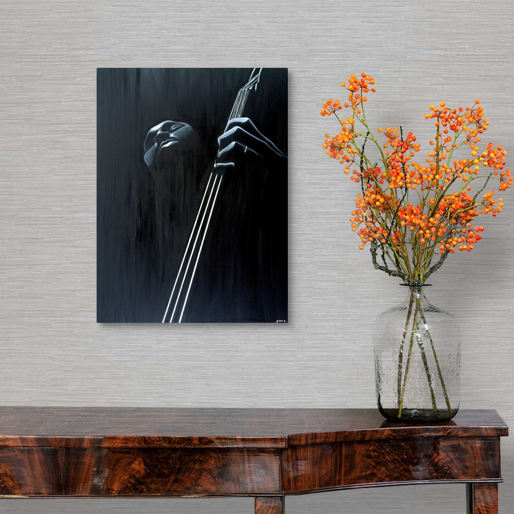 A traditional room featuring Big contemporary monochromatic art focuses on a close-up of a man playing the bass against a slig...