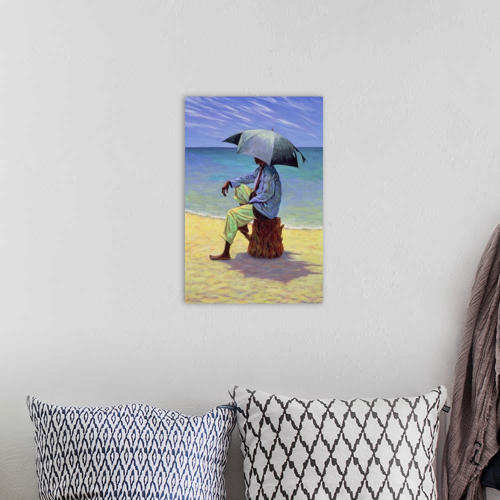 A bohemian room featuring This vertical painting is a figure sitting on a tree stump on a sandy beach with the ocean behind...