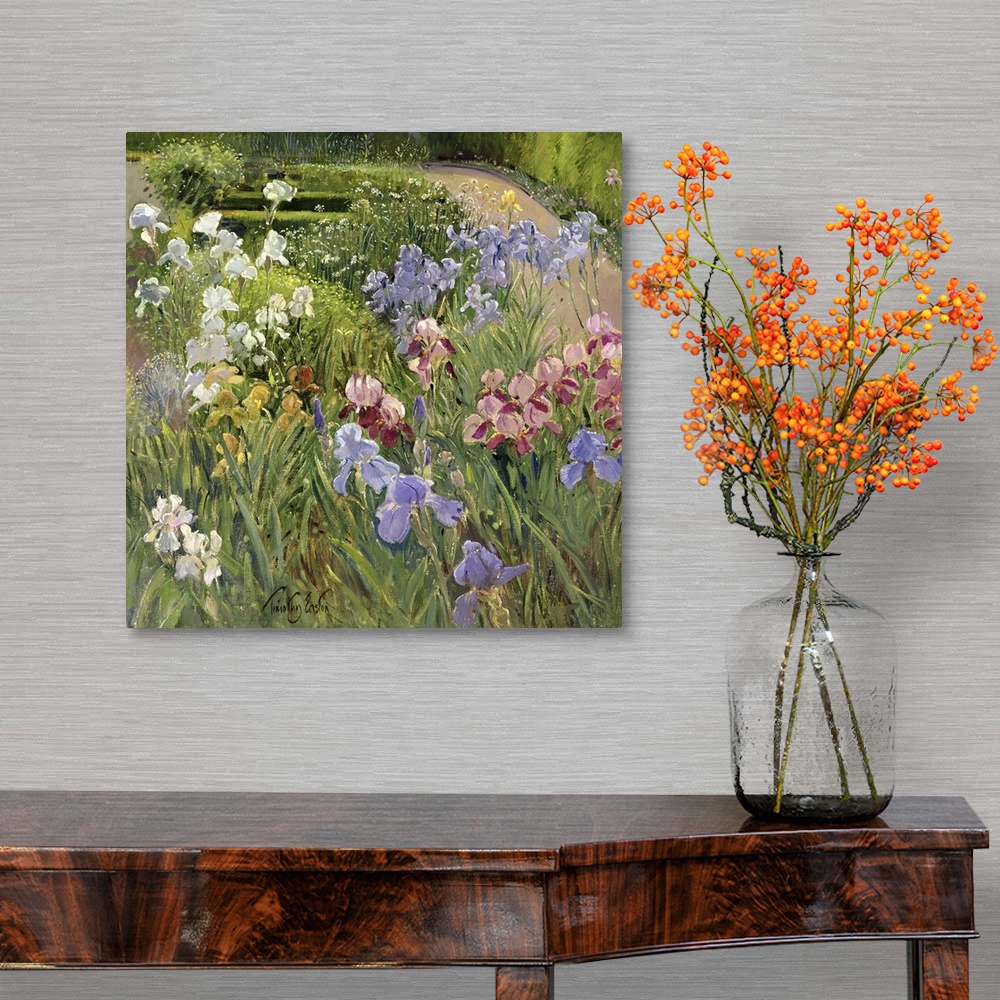 A traditional room featuring A beautiful painting of different types of flowers in a lush green garden.