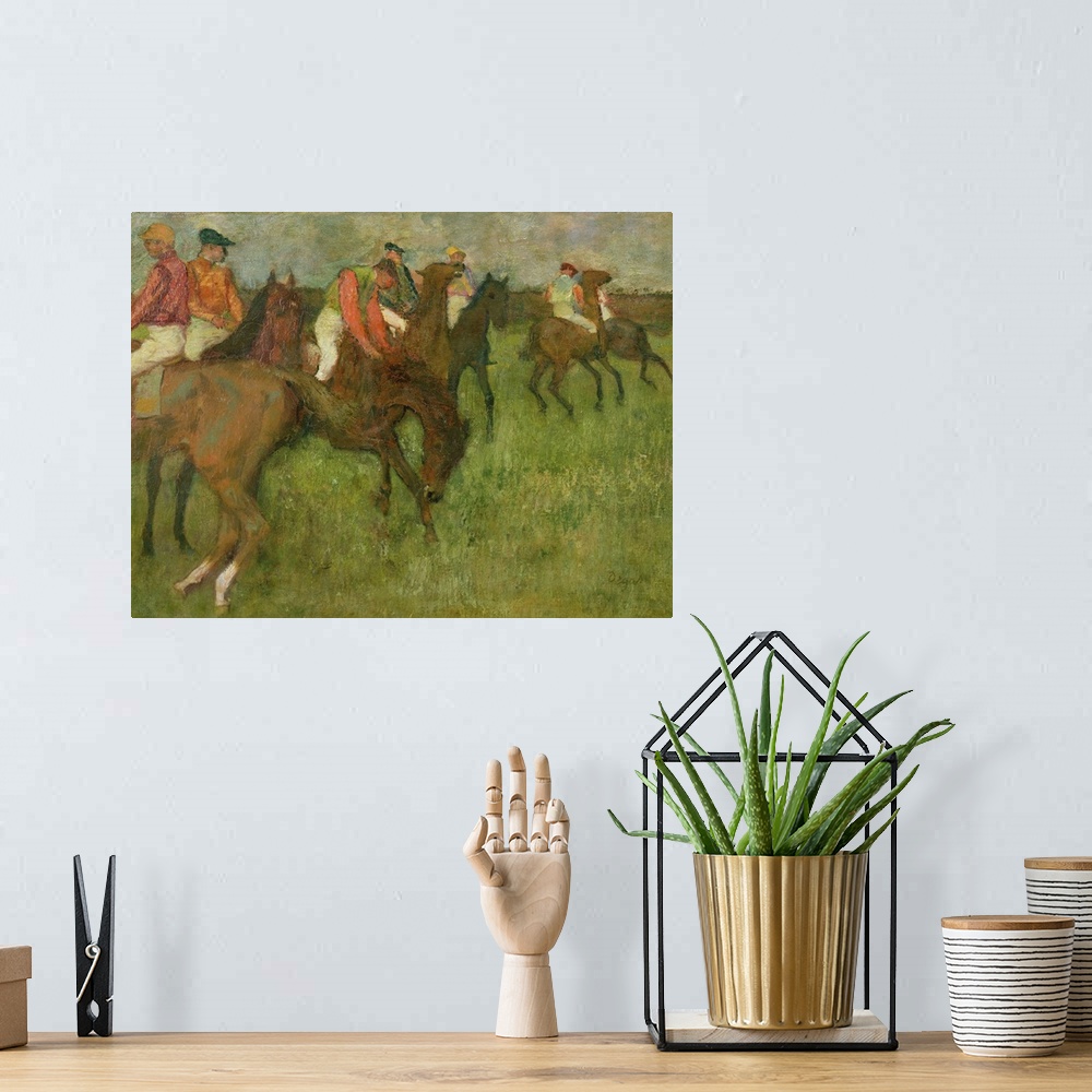 A bohemian room featuring Edgar Degas painting of horses and horse racers in a field.