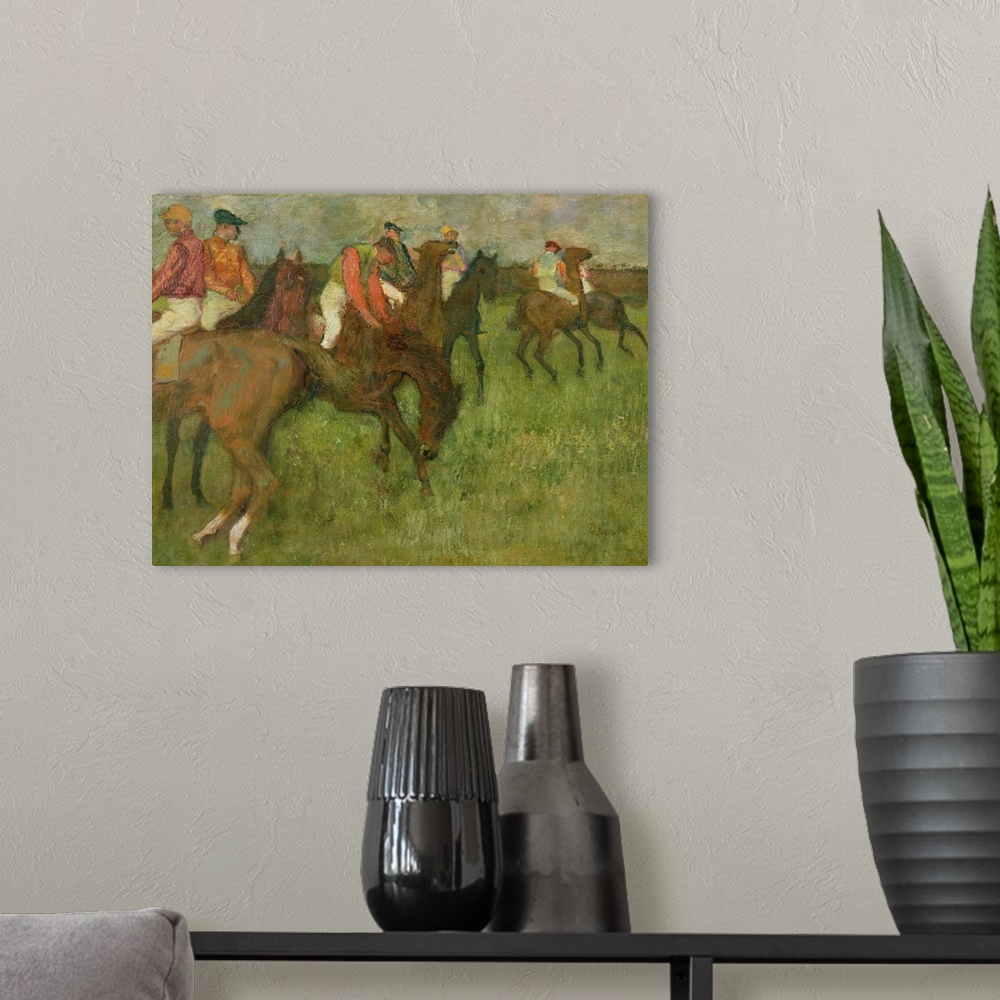 A modern room featuring Edgar Degas painting of horses and horse racers in a field.
