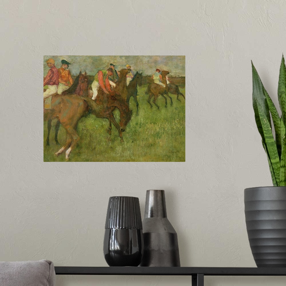A modern room featuring Edgar Degas painting of horses and horse racers in a field.